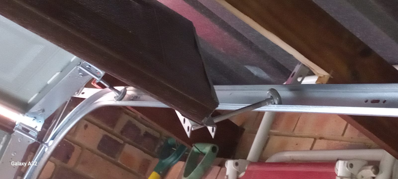Garage door track and roller repair